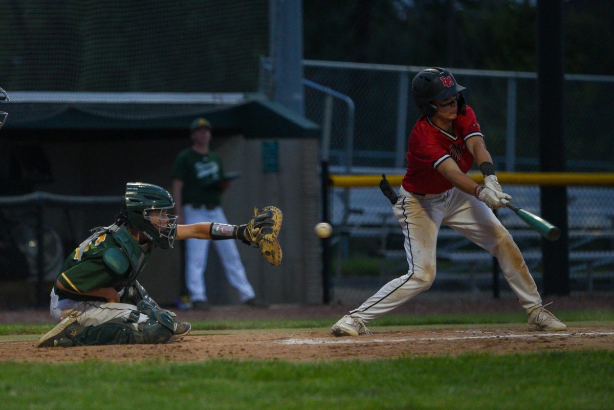 Catches the ball for his team, Tyler Trudo.