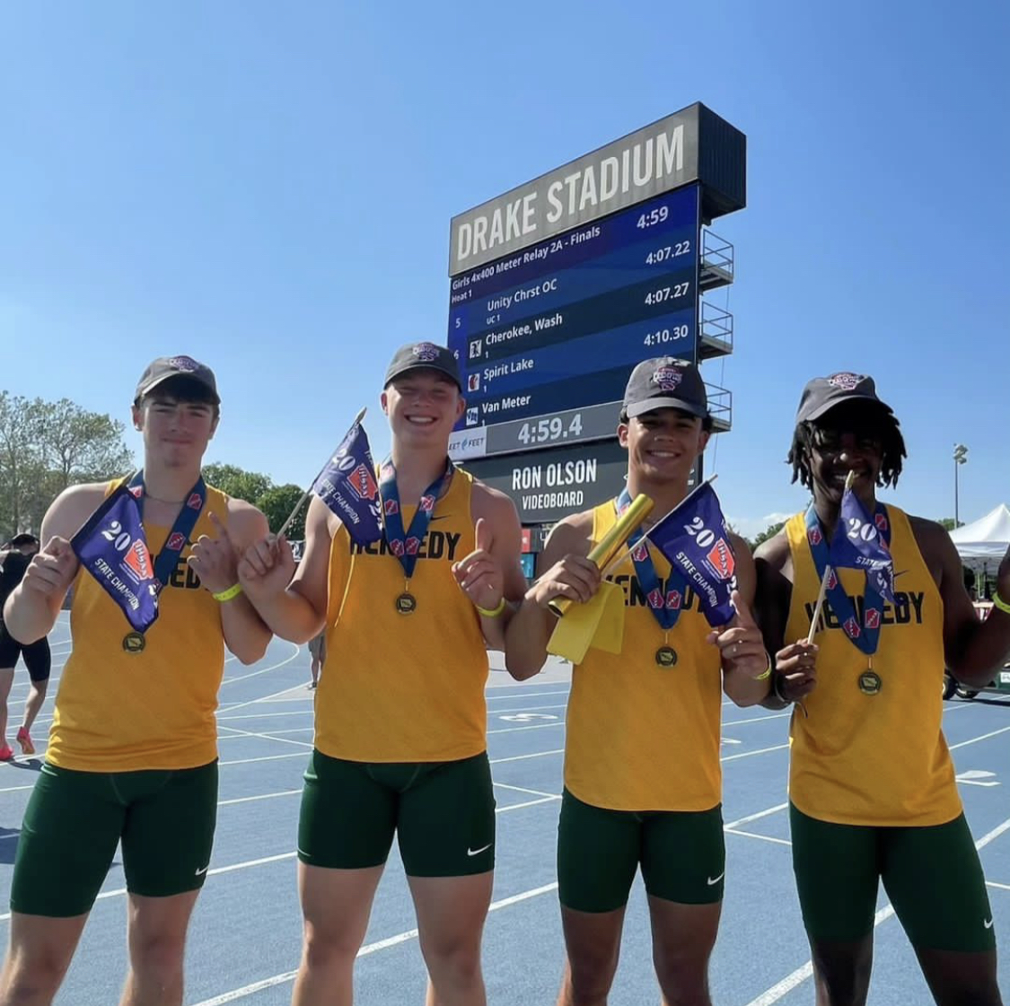 The Kennedy 4x1 relay team of Dawson Dougherty, Jacob Doyle, Nick Wood and Chauncy Bodden pose for a picture after breaking a state record.