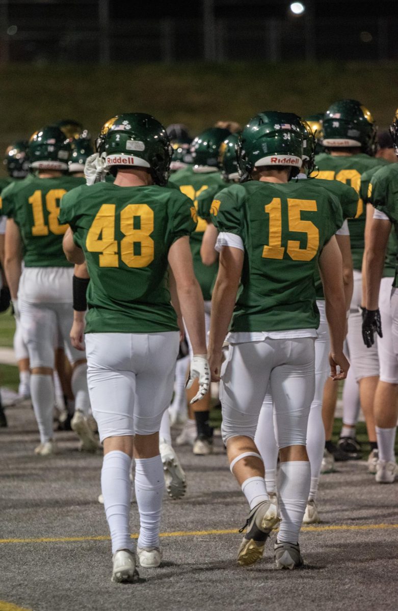 Kennedy walks off the field after their initial grand entrance.