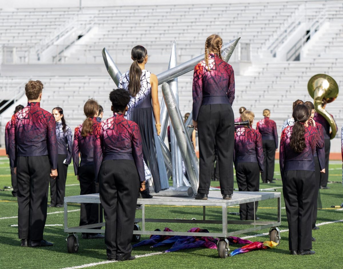 Color guard and band members get into position for the show to begin.