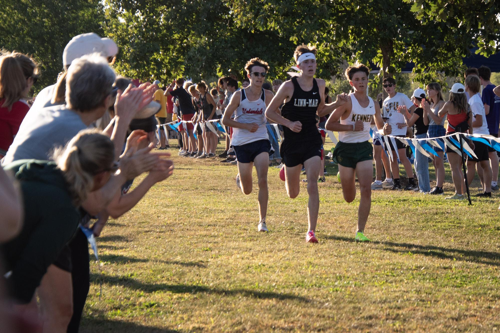 Junior Adam Gray enters the homestretch sprinting. 