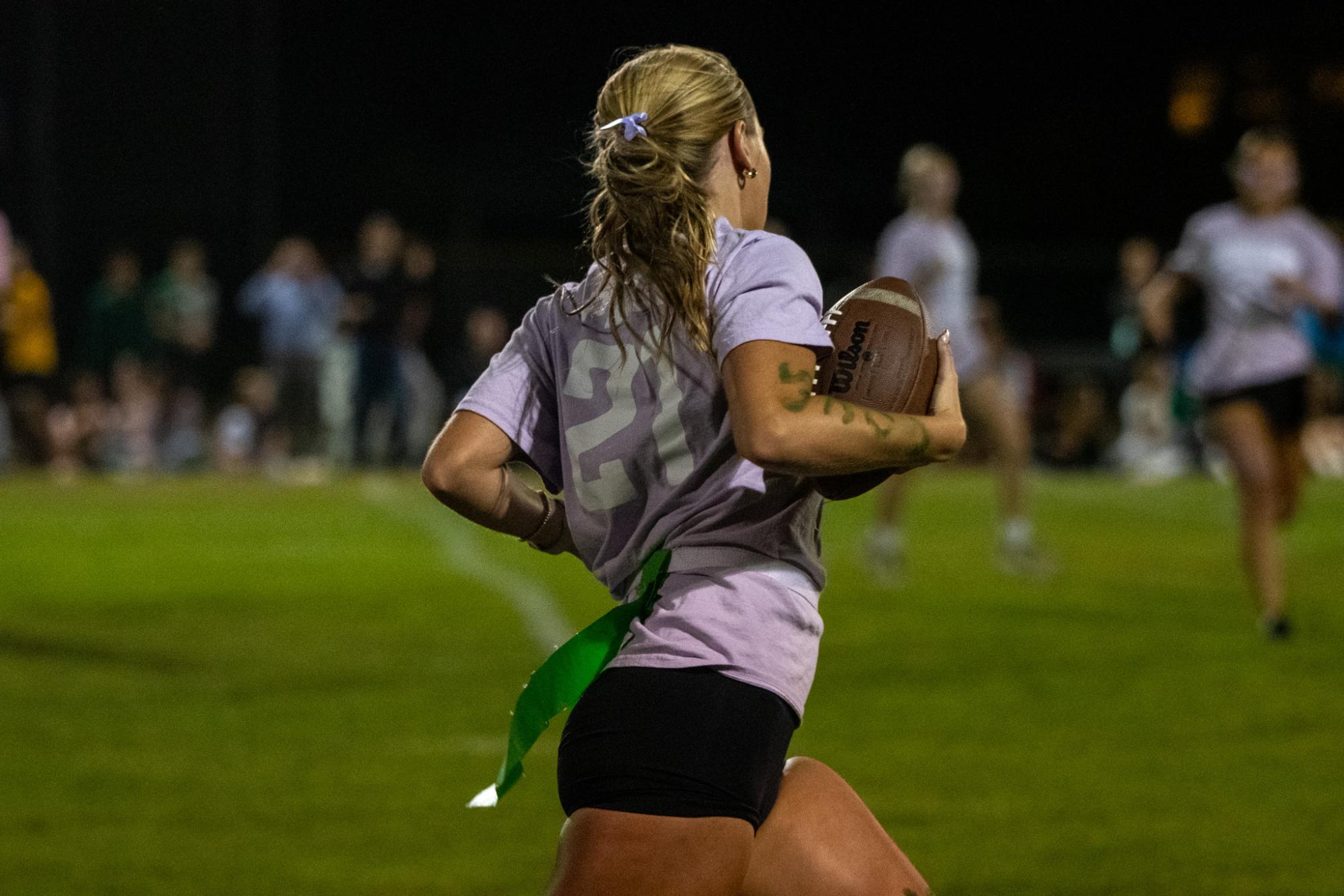 Junior Ellison Pierce runs the ball during the annual Powderpuff game.