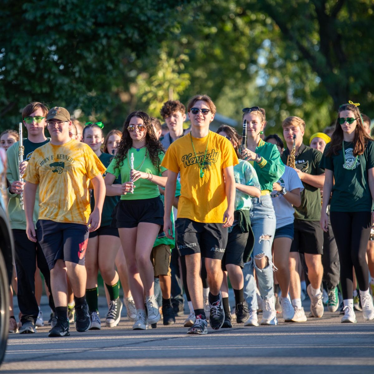 Kennedy Marching Band plays the fight song as they march.