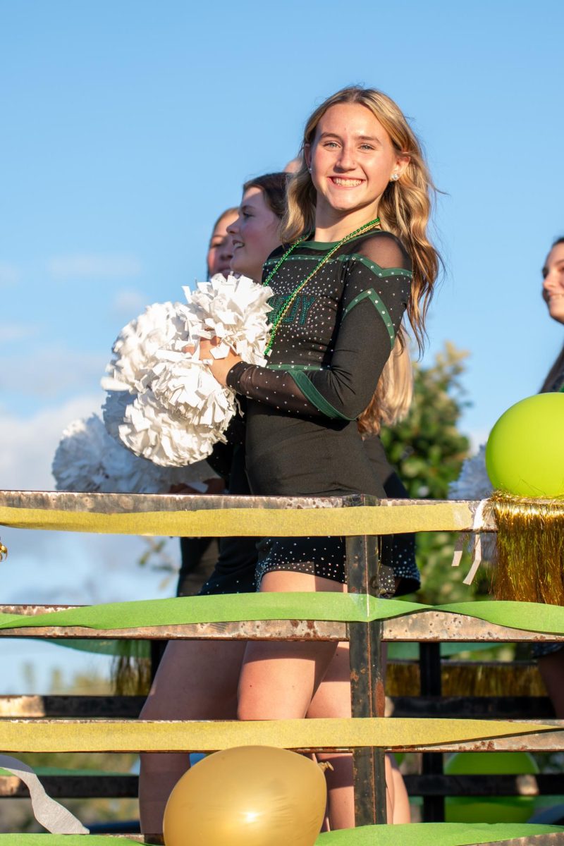 Senior Skyler Moody cheers for Kennedy Dance Team.