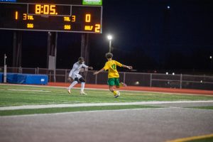 Taking a shot on goal, freshman Bibek Magar looks to get his first goal on the season. 