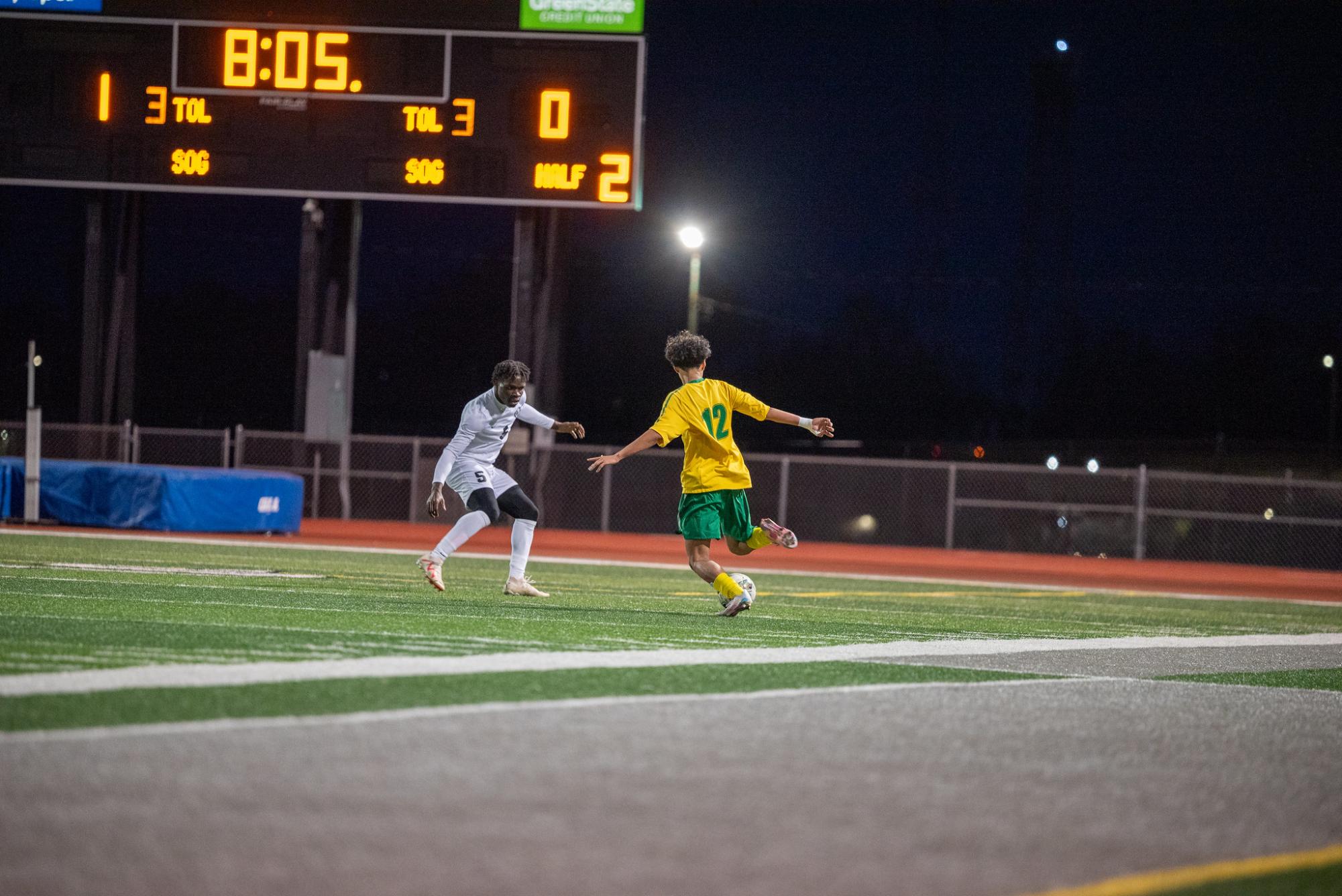 Taking a shot on goal, freshman Bibek Magar looks to get his first goal on the season. 