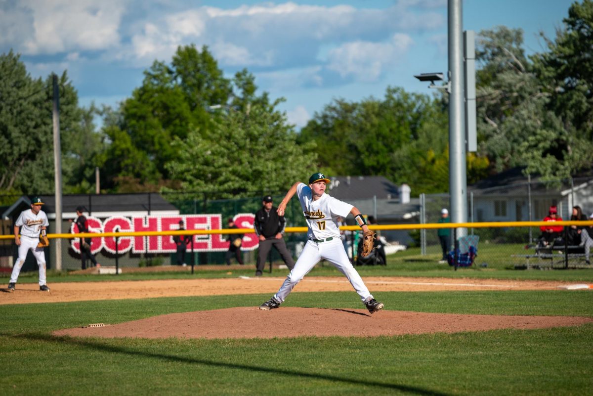 Uncorking his pitch, junior Leo Koester looks to strike out another City High player