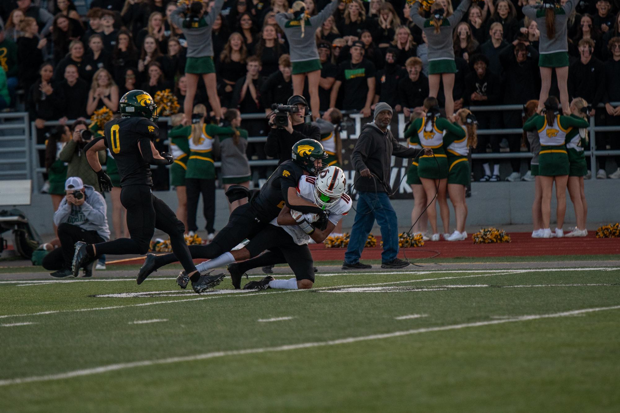 After hawking down Prairie receiver, Senior Jace Popenhagen makes a crucial tackle just before the endzone. 