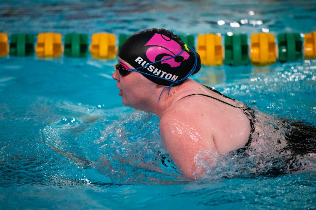 Breaking through the water during 100y breaststroke, senior Ella Rushton.
