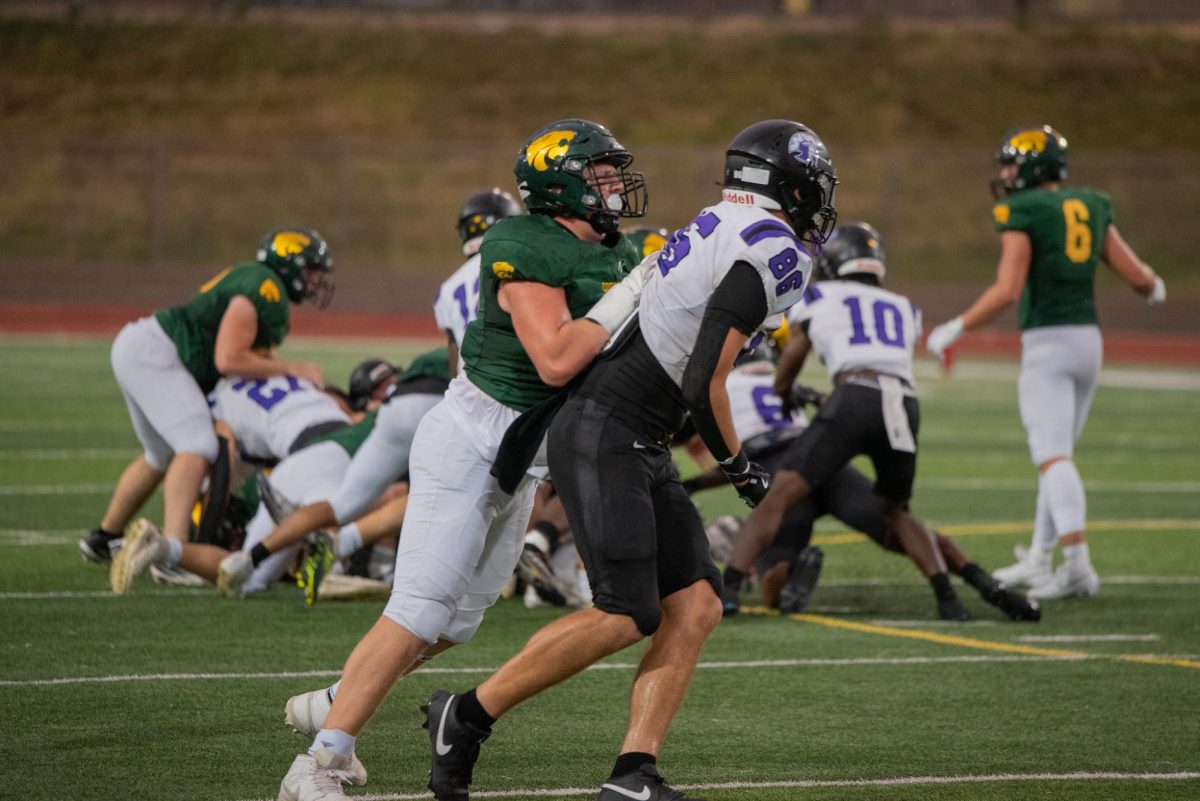 Locking down 4 star Texas A&M commit, senior lineman Lincoln Oltmann holds off Waukee defense.