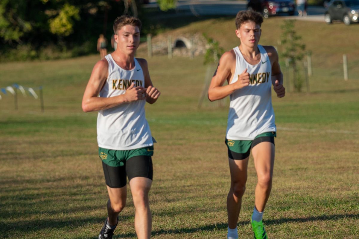 Running together, Senior Grant Pattridge and Senior Ryker Scheckel speed up to finish the race together.