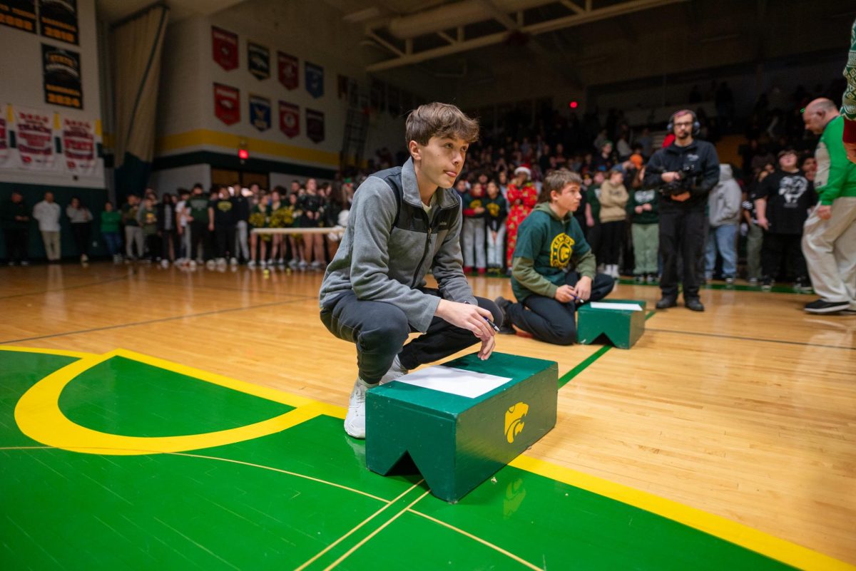Preparing for a math challenge, sophomore Alex Anderson patiently awaits his problem. 
